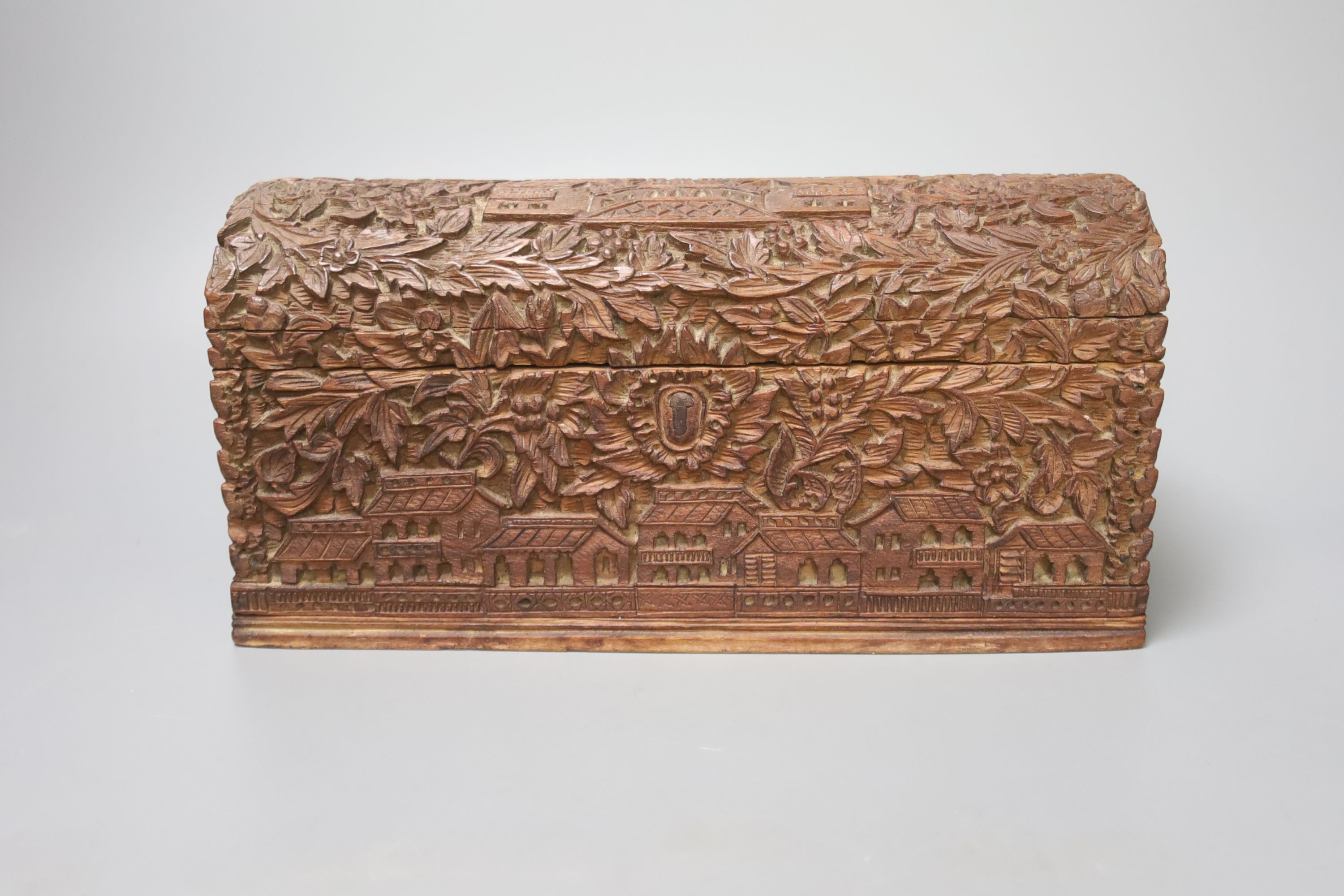 Four Chinese carved wood boxes, largest 24 x 12cm